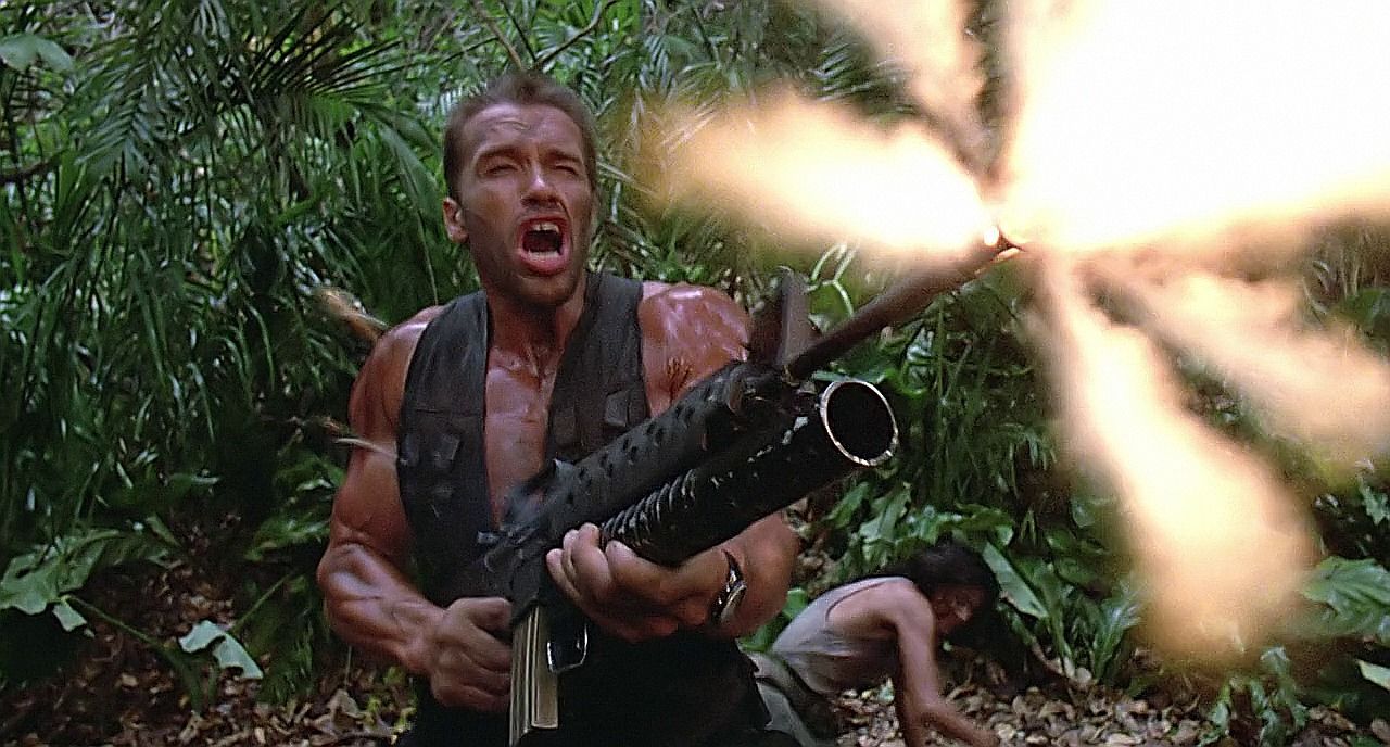 Dutch opening up with a full auto M16  after the death of one of his squad members in the movie Predator.